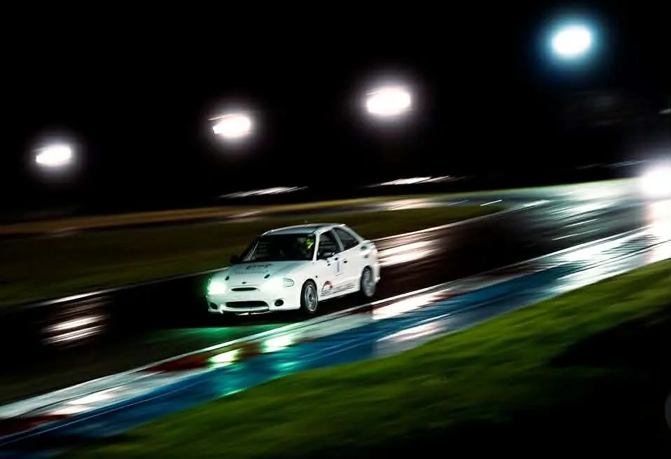 Revs Mechanical endurance race car competing at night